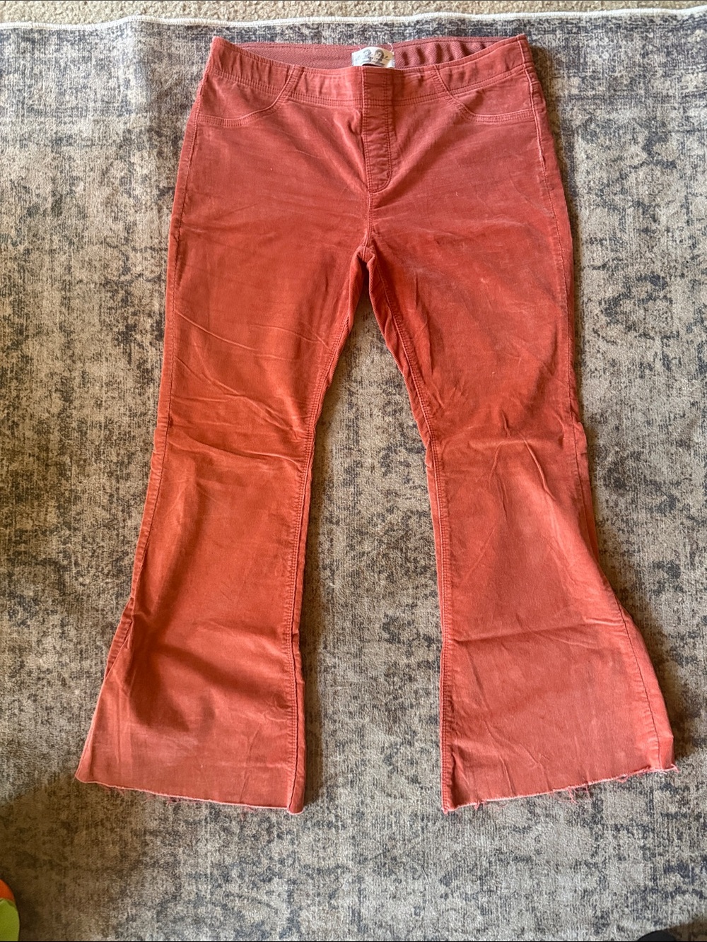 We The Free Corduroy Flare Pants in Rust